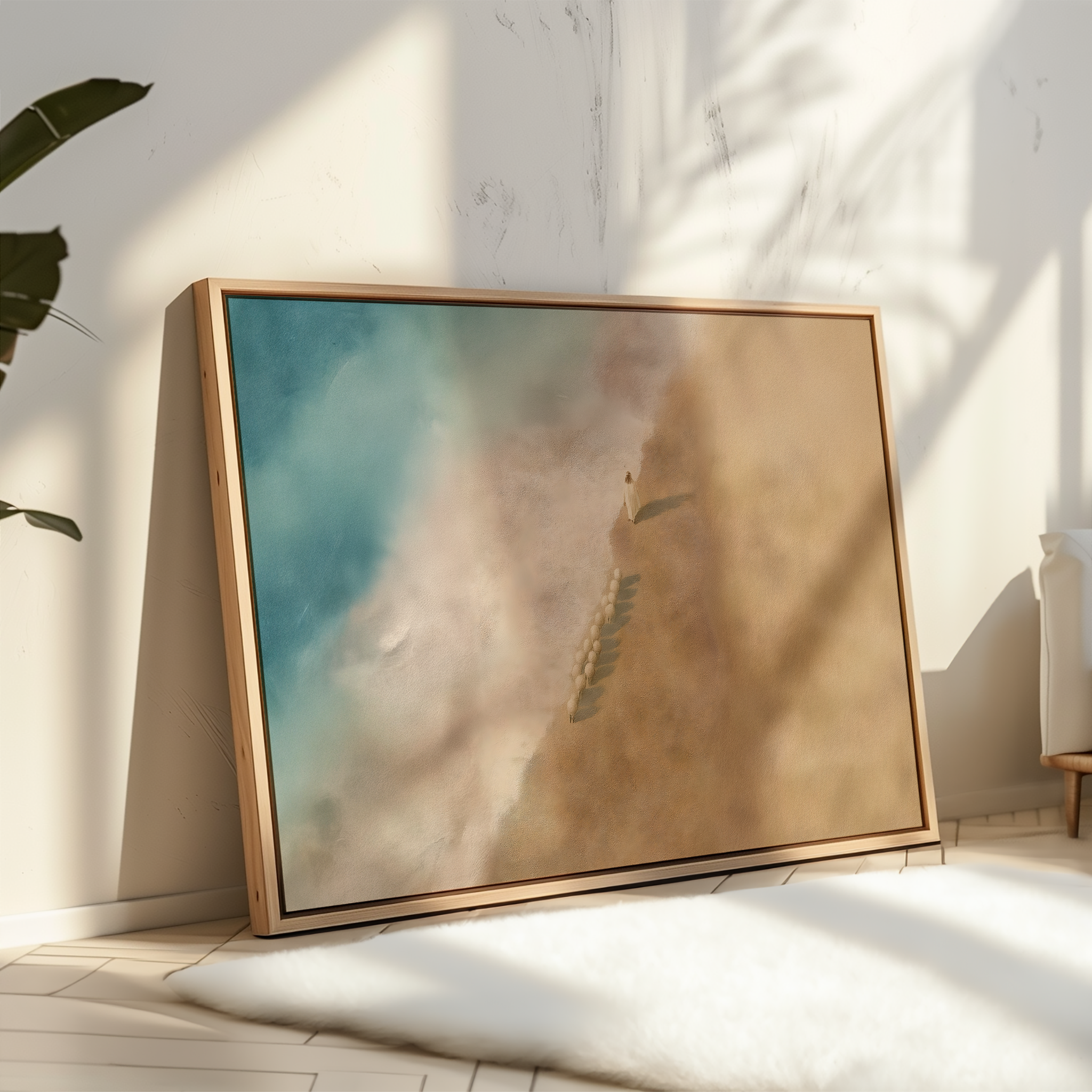 Framed artwork on a wall with natural light casting shadows